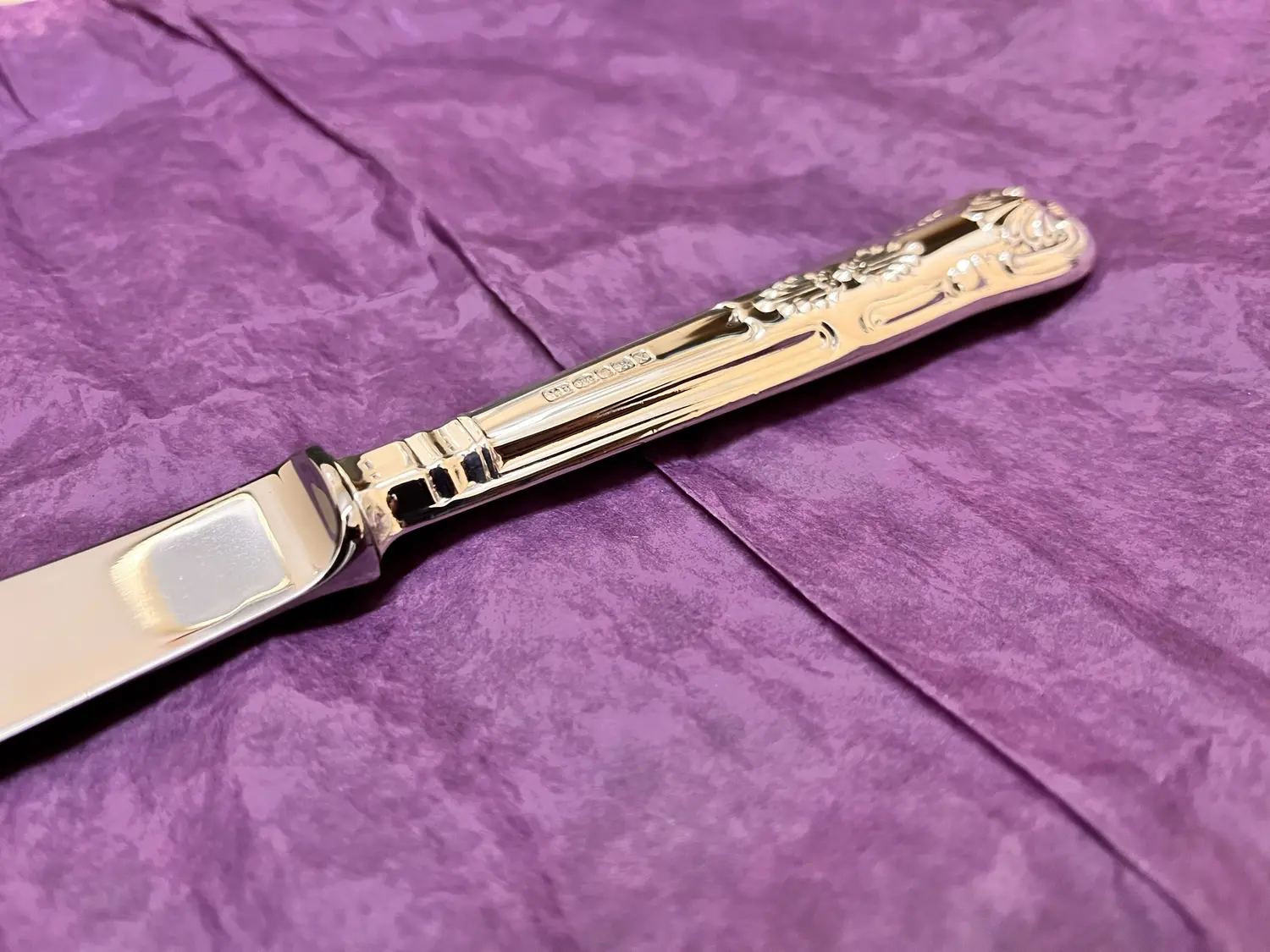 Ornate antique-style silver knife finished by Sheffield makers